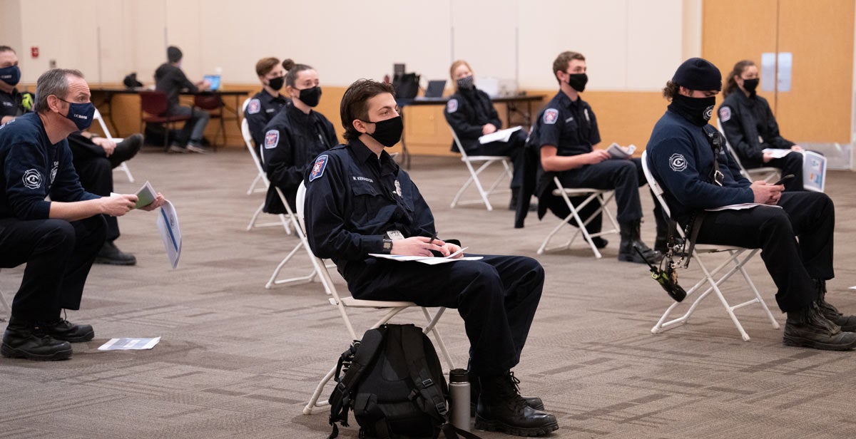 Fire Department personnel (in uniform) in training session