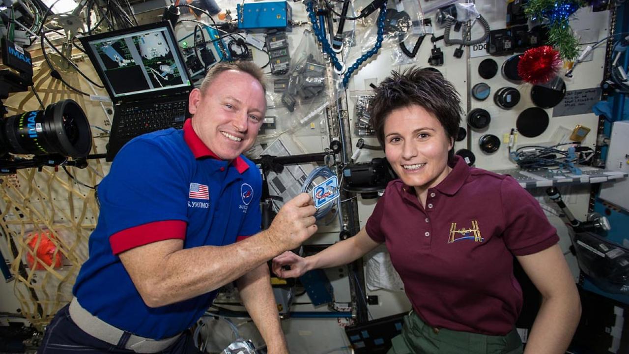 Astronauts Barry &ldquo;Butch&rdquo; Wilmore (left) and Samantha Cristoforetti float in the International Space Station.