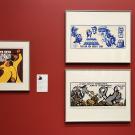 various prints on red wall