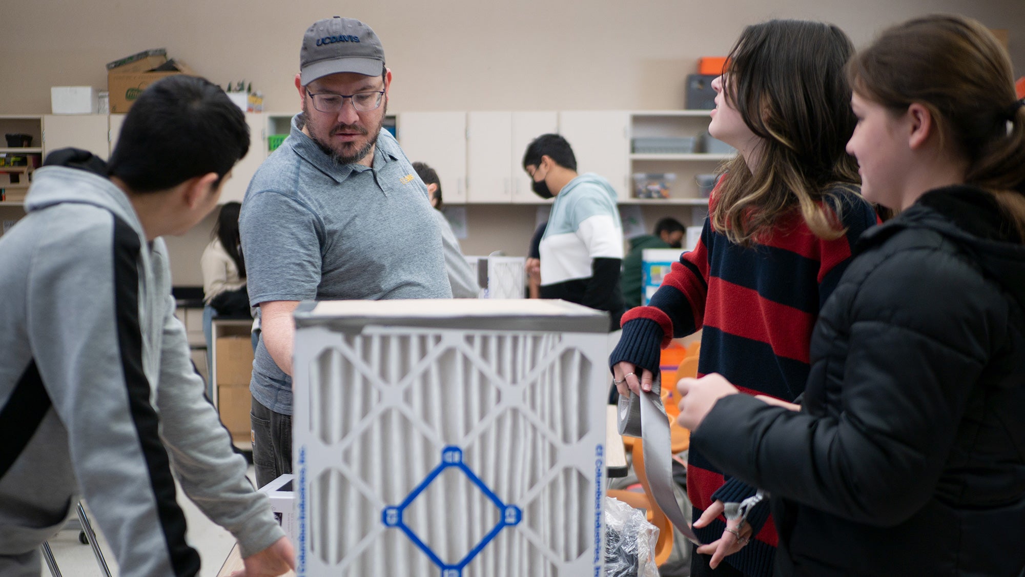 DIY project in a school where children learn to build an air filtration system