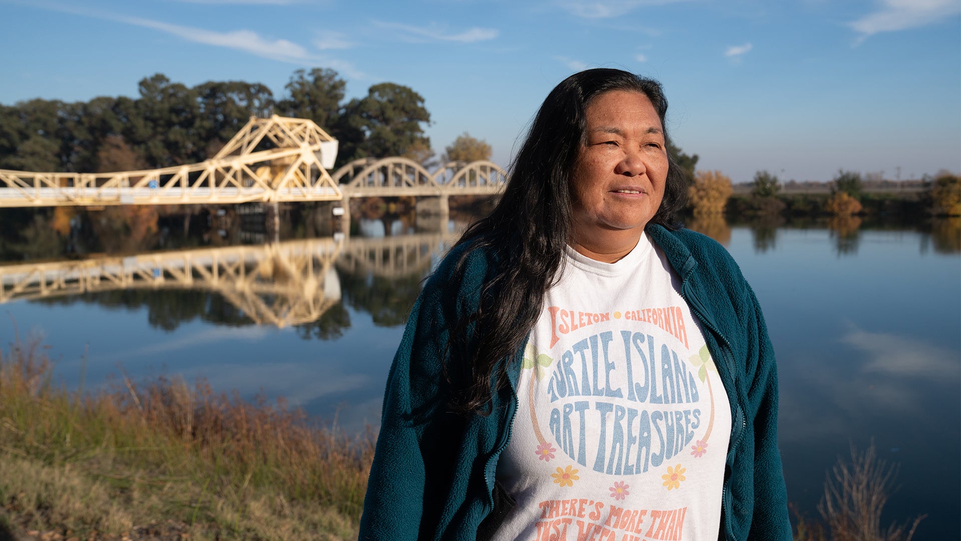 Mayor Pam Bulahan overlooks the Sacramento River in Isleton, California. (Alysha Beck/UC Davis)