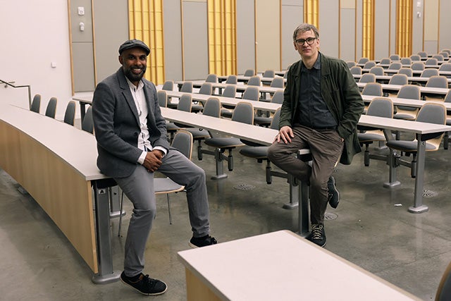 two faculty in a classroom