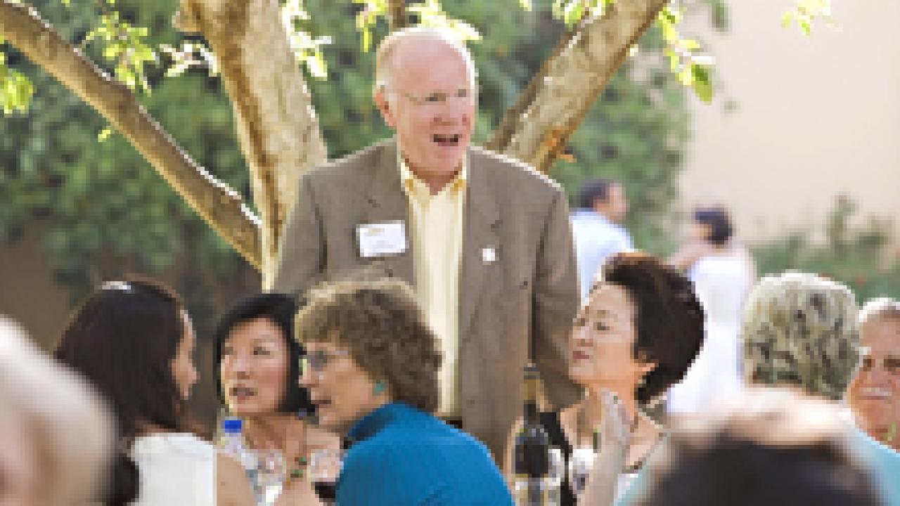 Chancellor Vanderhoef circulates among the guests at his tribute dinner.