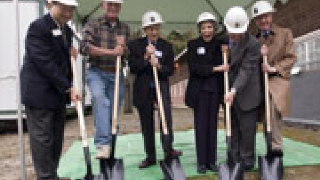 Warren and Leta Giedt, third and fourth from the left, respectively, break ground on Giedt Hall, a classroom building slated to open in 2007. Chancellor Larry Vanderhoef, far right, lends a helping hand along with engineering college Dean Enriqu