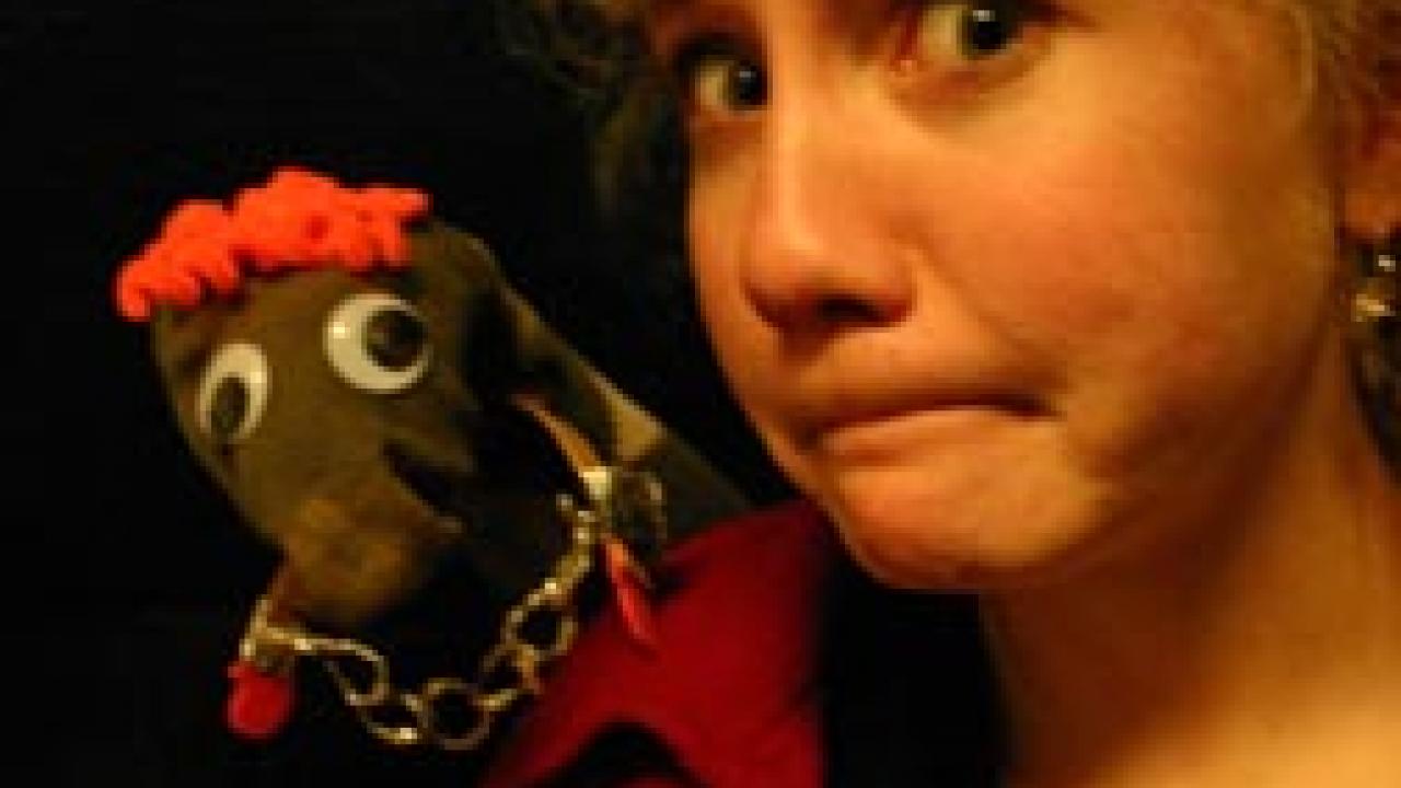 Claire the amnesiac (played by Sarah Stockdale) and a puppet are among the characters in Fuddy Meers.