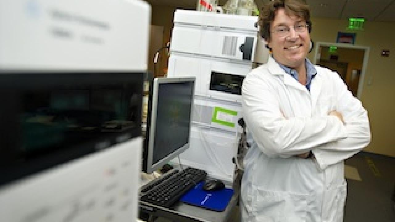 Oliver Fiehn standing in his metabolomics lab