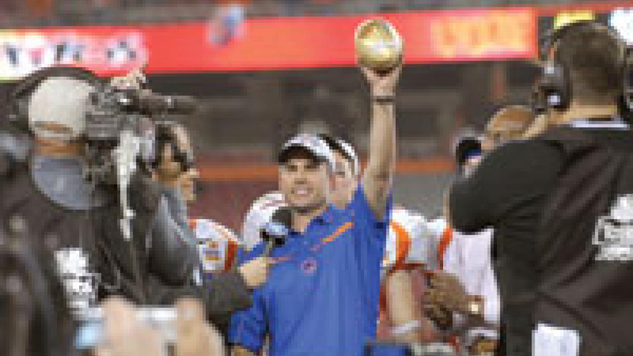 Boise State&rsquo;s Chris Petersen celebrates after his team&rsquo;s victory in the 2007 Fiesta Bowl.