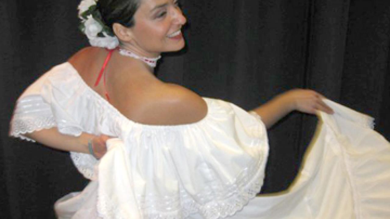 Photo: Monica Bosque dances during last year's Serenata Colombiana