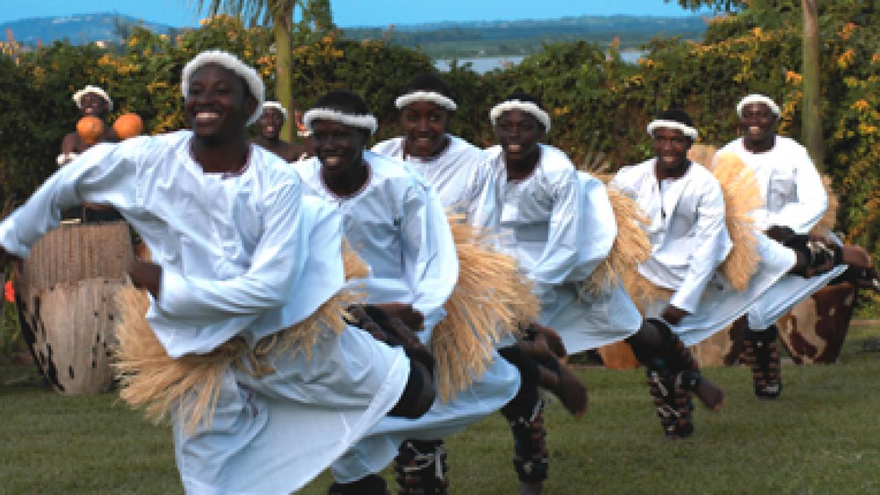 Spirit of Uganda uses drums and other percussion instruments, stirring call-and-response vocals, vibrant and colorful costumes, and dramatic choreogra