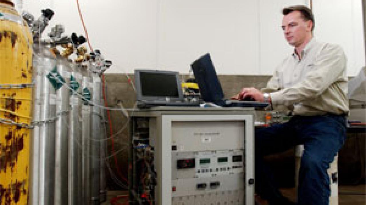 UC Davis air quality specialist Frank Mitloehner evaluates bovine emissions samples.