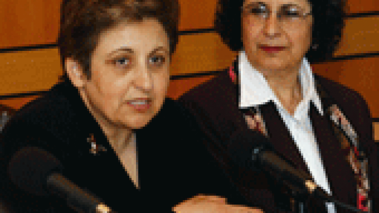 Suad Joseph, a campus expert in Middle Eastern family issues, looks on as Shirin Ebadi speaks candidly at Tuesday&rsquo;s press conference.