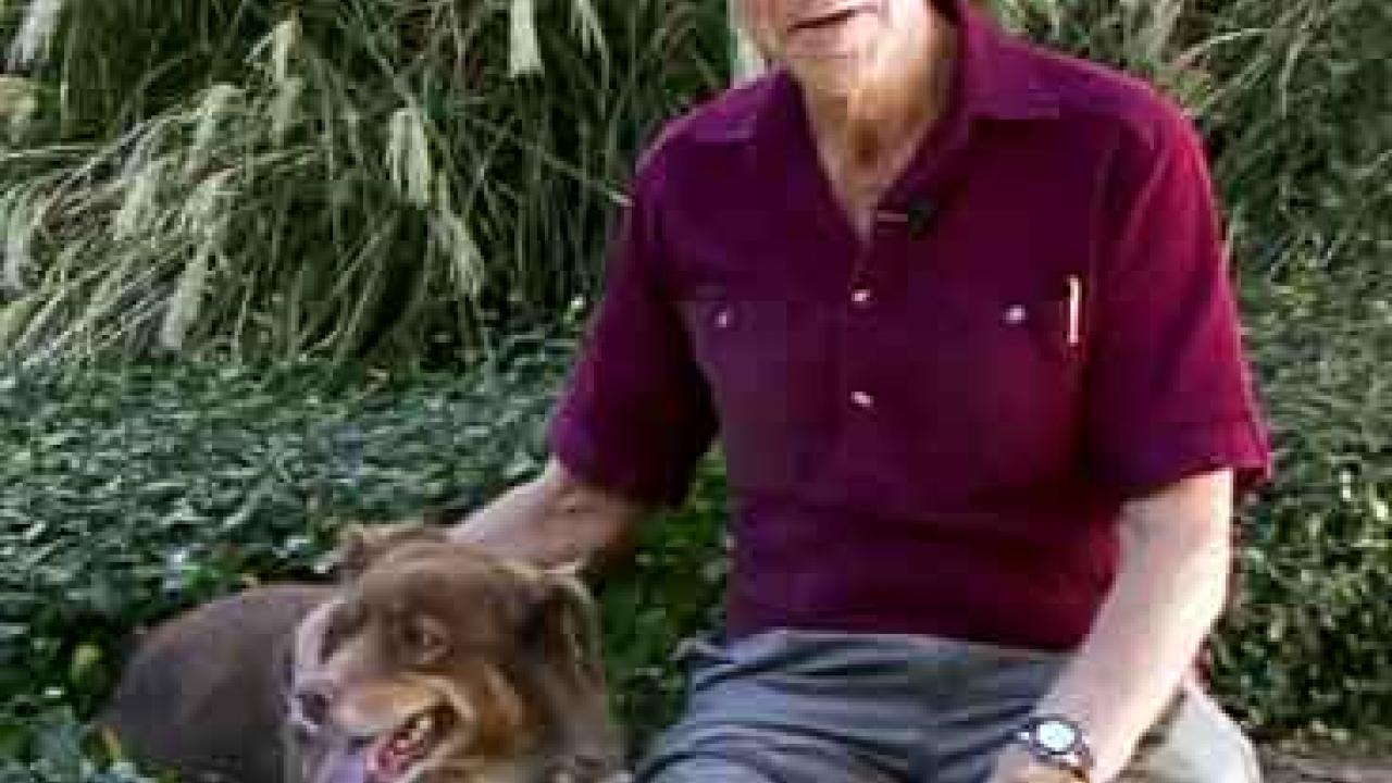 Image from video: Benjamin Hart and dog