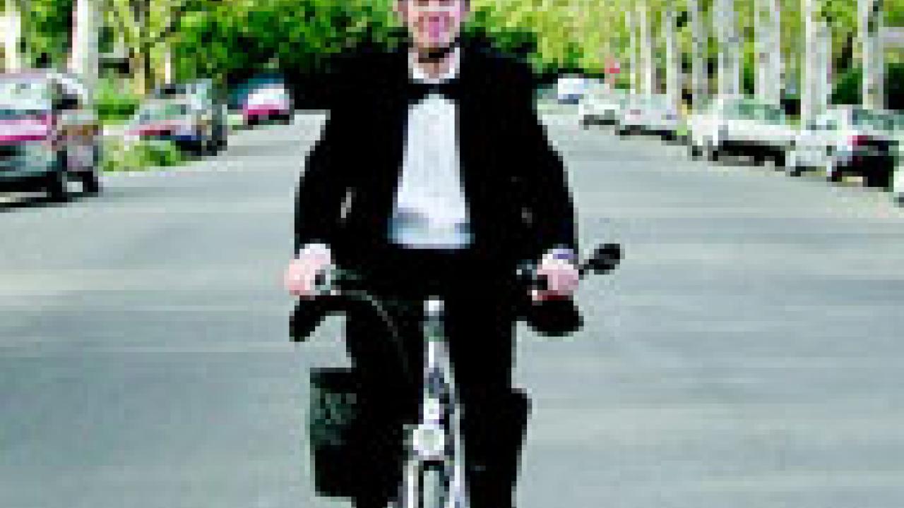 Vice Chancellor for resource management and planning John Meyer, epitomizes the bicycle culture on campus as &Atilde;&#145; decked out in formal tuxedo wear &Atilde;&#145;  h