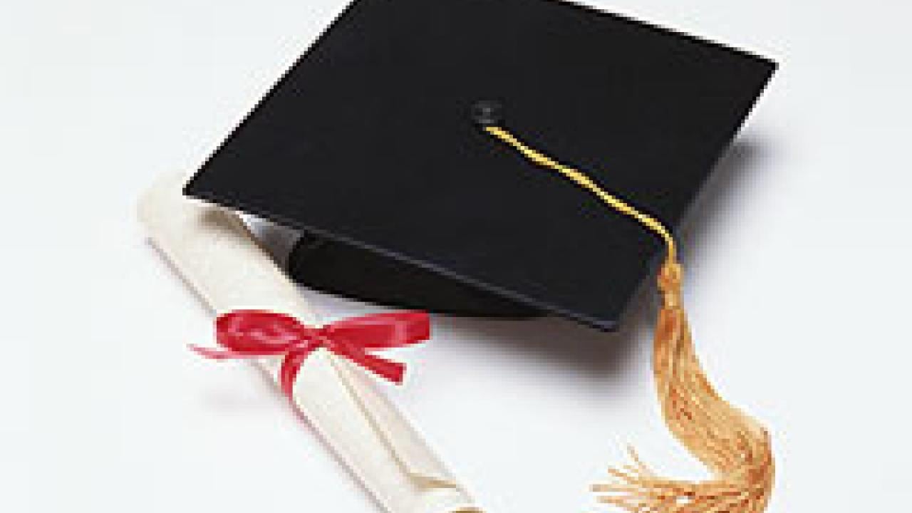 Photo: mortarboard and scroll