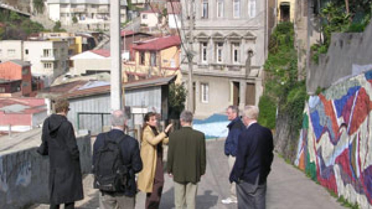 The UC Davis delegation tours the Open Sky Museum in Valparaiso, Chile, led by museum curator Paola Pascual Concha, center in tan coat. Other delegates are, from left, are Rosalie Vanderhoef, Bill Lacy, Bob Kerr, Tu Jarvis and Chancellor Larry V