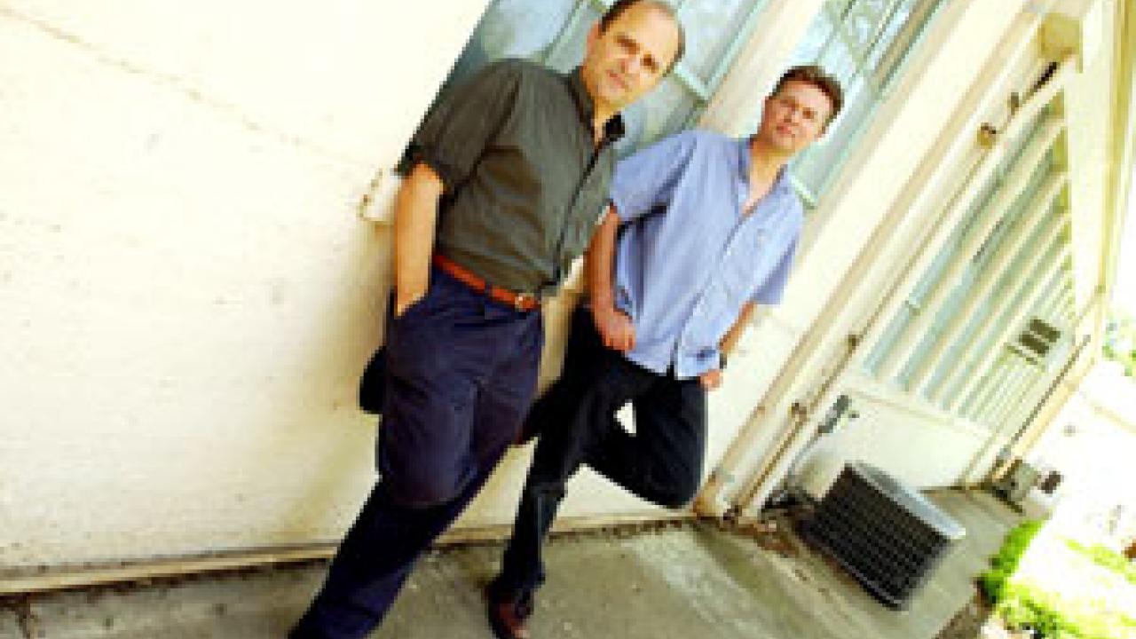 Photo of Douglas Kahn and Jesse Drew outside the Art Annex