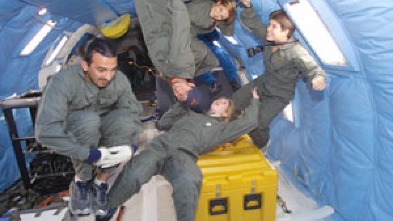  Clockwise from left, Cosan Unuvar, Anthony Manerbino, Daniela Fredrick,  Laurie Harvey and Jennifer Sween get a feel for what it&rsquo;s like to be almost gravity-free aboard NASA&rsquo;s &ldquo;Weightless Wonder.&rdquo; All of the students except Manerbino ar