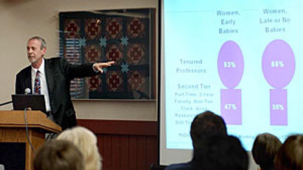 Robert Drago, a professor of labor studies and women&rsquo;s studies at the Pennsylvania State University, outlines the effect of child-rearing on women&rsquo;s abilities to move forward in their academic careers during last week&rsquo;s talk in the Caberne