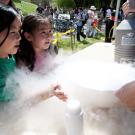 Photo: Linda Yang and Katherin Yu see the power of liquid nitrogen at last year's Picnic Day, when chemistry students made mango sorbet.