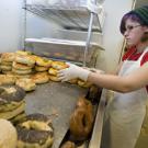 Student employee Jackelyn Smith, works a recent lunch shift at the Coffee House's bagel station.