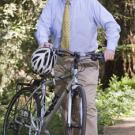 Graduate Studies Dean Jeff Gibeling, who rides about 75 to 100 miles a week, is pictured with his bicycle in his favorite spot on campus: the redwood 