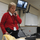 UC Davis Emergency Manager Valerie Lucus confers with other officials during the Jan. 4 windstorm. She is pictured at the campus&rsquo;s Emergency Operations Center, which is equipped with telephones and computer connections, along with televisions 