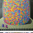 Photo of painting (Mathew Zefeldt's "Cylinders," 2011, acrylic on canvas, 72 by 98 inches); and an image from Jen Cohen's "Venus + X," 2011, HD video