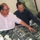Printing the map: Chris Didio, left, geographical information system analyst, and planner Matt Dulcich examine one of the 18 sections, each 10 feet lo