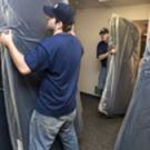 UC Davis students Scott McCormick, foreground, and James Keith were part of a crew that moved 200 new mattresses into two residence halls last week to