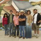New mural, Pioneer, at Woodland High School, with Malaquias Montoya and student artists.