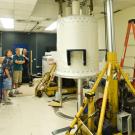 Jeff Walton, Jeff de Ropp and an unidentified Bruker Biospin employee check on the installation progress.