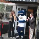 Aggie mascot Gunrock, Gina Rios of Sodexo and Brett Burns, director of Memorial Union Auxiliary Services, at the Gunrock Pub ribbon-cutting on Jan. 5.