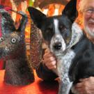 Cato, the dog pictured here with Roy De Forest, is expected to be at the Nov. 13 tribute to the artist.