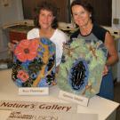 Diane Ullman and Donna Billick, with some of the tiles that the women crafted for Nature's Gallery.