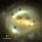 Photo: gravitational lens showing two gallaxies