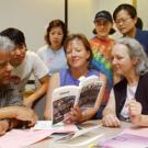 Those helping with the book project include, left to right seated, Carl Jorgensen, Karen Roth and Alison Kent, and, standing, Gabriel Bang, Wendy Yu, Gabe Koulikov, Anita Poon and Lynn Narlesky.