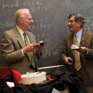 Chancellor Larry Vanderhoef, left, shares some laughs and cake with Professor Zuhair Munir, who was chosen for the 2007 UC Davis Prize for Undergraduate Teaching and Scholarly Achievement. 