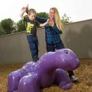 Photo: Amanda Sanderson and her son, Bradley, in a play yard