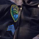 A badge and patch for the Davis Police Department.