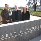 Trio stands behind the Larry N. Vanderhoef Commons sign.