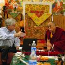 Phil Shaver talks with the Dalai Lama during last fall&rsquo;s meeting, which examined how people can alter the way they interpret and react to the world, a key tenet in Buddhist teachings.