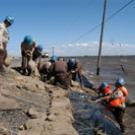 California Conservation Corps workers pile sandbags to shore up a levee during flooding on the delta&rsquo;s Jones Tract in 2004.
