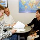 UC Davis student Nick Weiler, left, meets with Education Abroad staff members, from left, Joel Shriver, Diane Adams and Aida Saldivar to  discuss coursework available in foreign countries. Weiler represents a growing number of students who refus