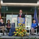 John Garamendi, now California State Insurance Commissioner, speaks to the building dedication audience as other key players in the development of the Genome and Biomedical Sciences Facility, from left, Chancellor Larry Vanderhoef, Phyllis Wise,