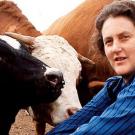 Photo: Temple Grandin in corral with cattle