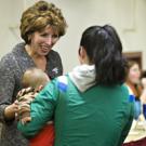 Chancellor Linda Katehi talks with graduate student Brook Colley at the Graduate Student Association's meeting on Jan. 6.
