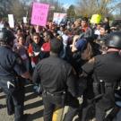 More than 300 students turned out March 4 to protest the decline in state support for UC. Above, students gathered near the Old Davis Road entrance to Interstate 80 before being turned away by more than 120 police officers. One student was arres