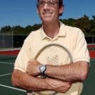 Tennis coach Bill Maze was doubles partner with John McEnroe at Stanford University. He is shown at the new tennis facility, where the first of two phases of construction is complete.