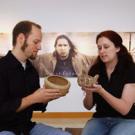 A photography exhibit by Shelley Niro provides the backdrop as 
Native American studies graduate students Michael Grofe and Lisa Woodard examine pine needle and sage baskets, respectively, in Carl Gorman Museum. The students say they are excite