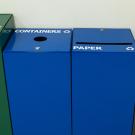 Four waste collection bins